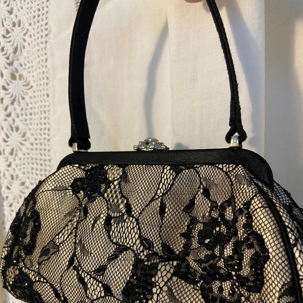 Black mesh over blush satin evening bag